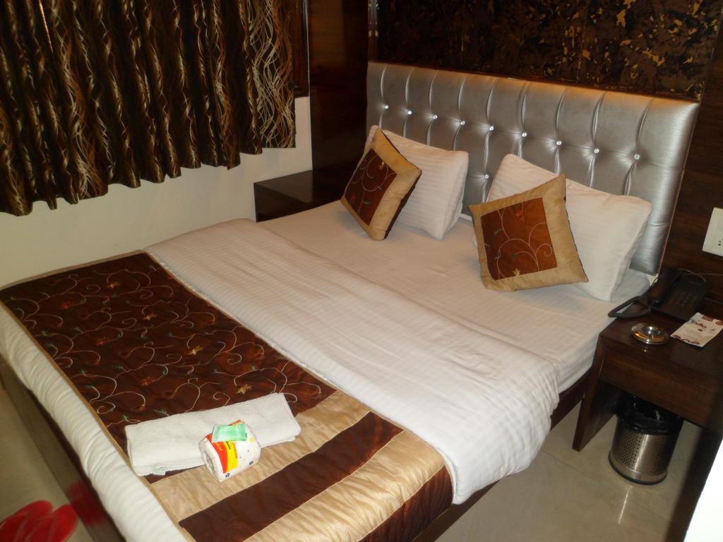 Hotel Arjun Нью-Дели Номер фото
